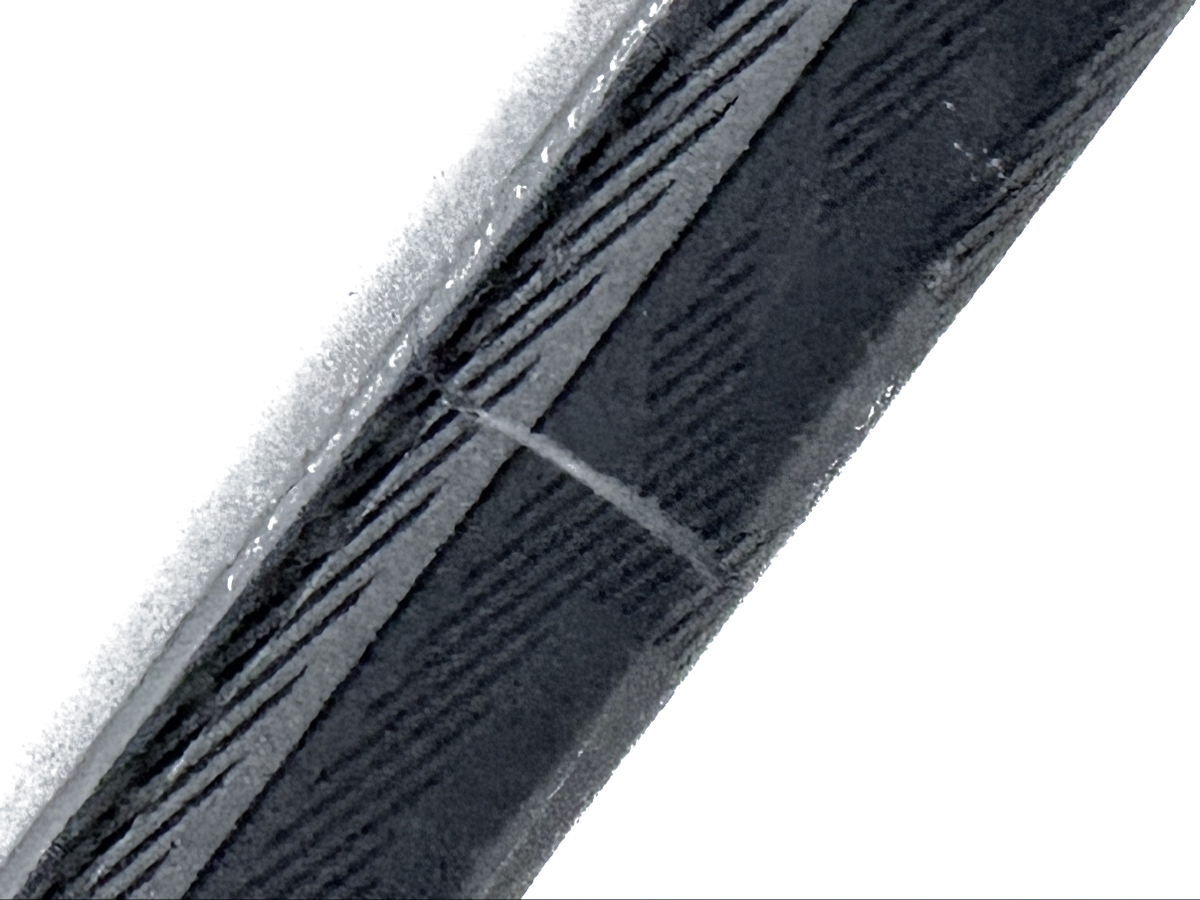 Close-up of professional shaft repair on refurbished Bauer Nexus E50 Pro hockey stick